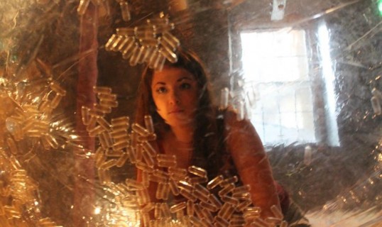 Performer Christie working with pill capsules inside her sorb. Photo: Creative Electric